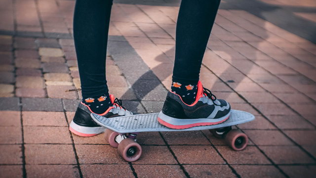 woman wearing leggings on skateboard