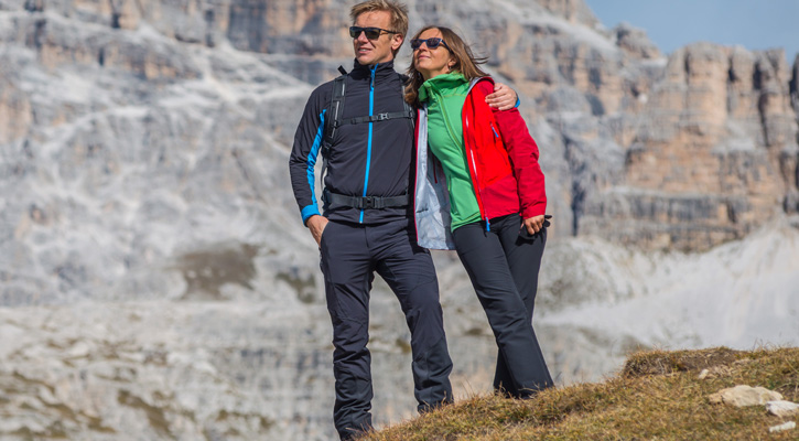 a couple hiking on the mountains