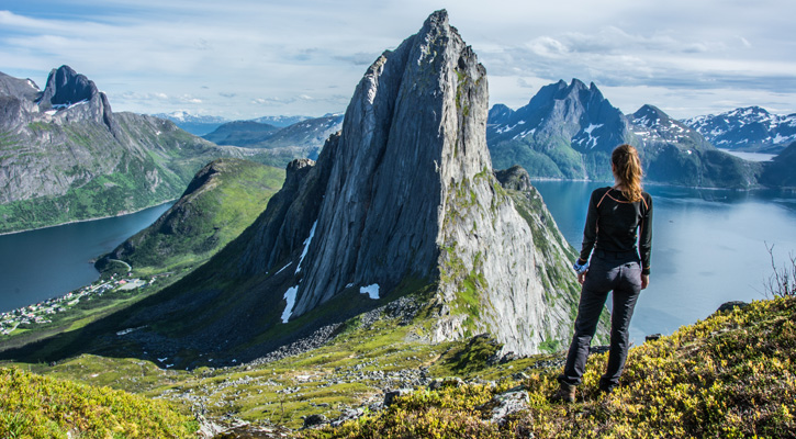 woman hiking in Norway in mountain trail