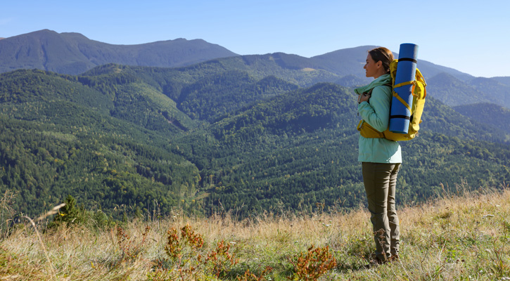 woman hiking on the mountains