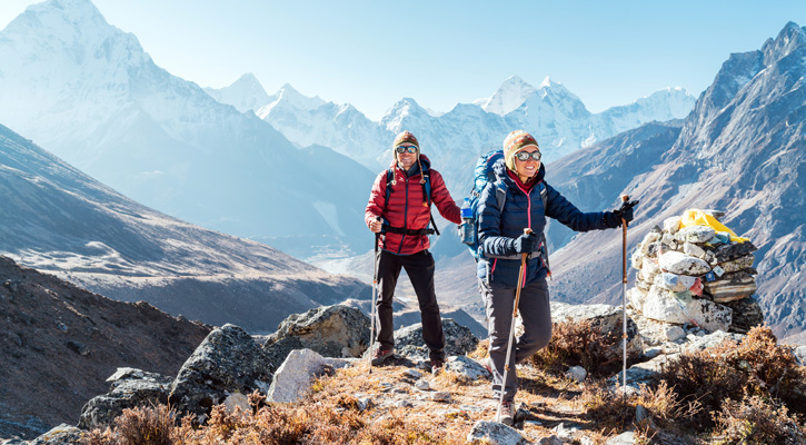 couple hiking on the mountains