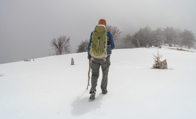 hiker on a snowy mountain