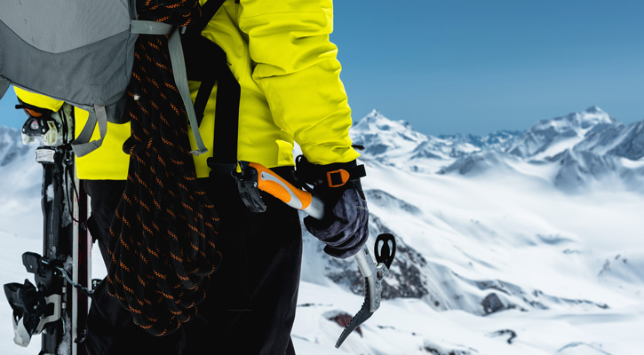 climber on top of a mountain