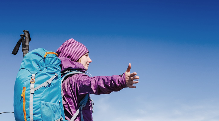 woman with backpack hiking