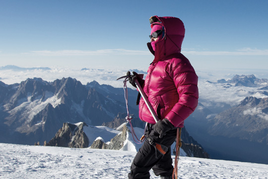 mountaineer wearing down jacket