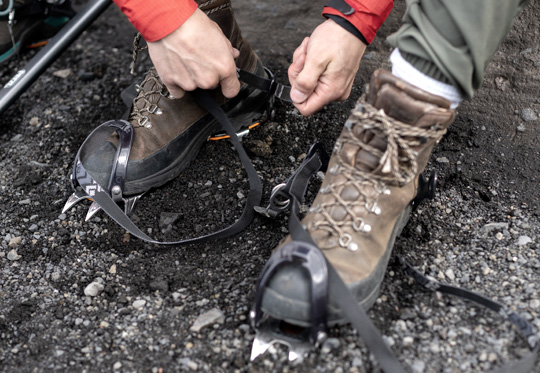 mountaineer wearing his boots