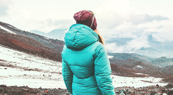 woman wearing a winter parka outdoors
