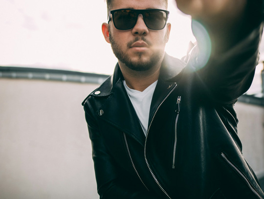 man wearing leather jacket